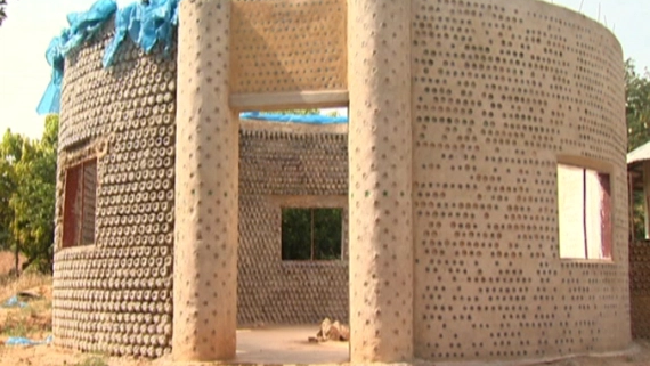 A Nigerian NGO builds earthquake-proof houses from recycled plastic bottles